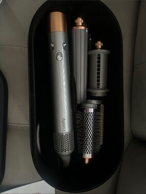 Dyson Men’s/Women’s Hair Styler in Gray with Copper Accents.
